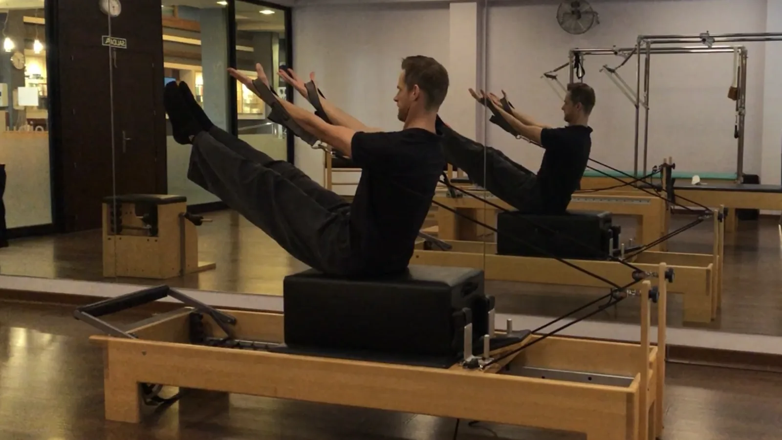 Bastiaan on a Pilates reformer